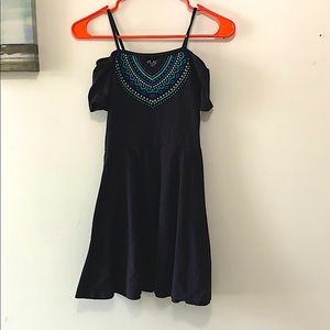 Black off the shoulder dress. With a cute design.